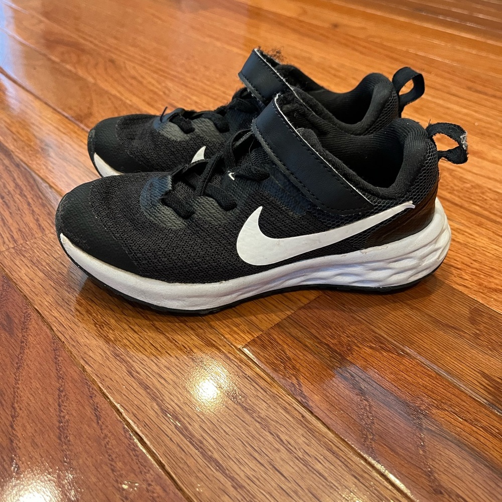 Kids’ Black and White Nike Revolution Shoes Size Toddler 11